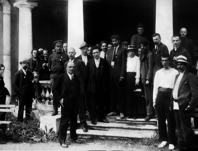 Delegates to the second congress of the Comintern at the Uritsky Palace in Petrograd. Amongst those pictured are: Karl Radek (third from the left); Nikolai Bukharin (fifth); Vladimir Lenin (tenth); Grigory Zinoviev (thirteenth); and Maria Ulyanova (nineteenth)