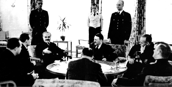 A cocktail party in Berlin, 1940, with Molotov and Adolf Hitler sat adjacent