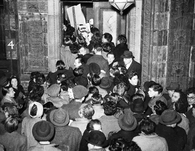 RCP comrades with placards blocking a fascist meeting at the Albert Hall