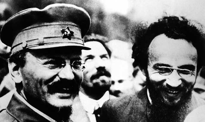 Trotsky, Rykov (behind) and Secretary of the Executive Committee of the Third International Jules Humbert-Droz celebrating the victory of the Red Army in the Civil War at a demonstration in Red Square, Moscow, 1920
